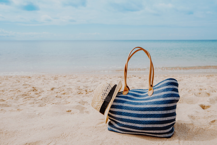 Travel Gear in Senior's Bag for Beach Trip - Aged Traveler